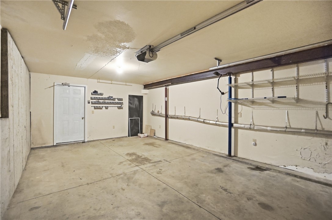 1208 Jarva Lane Springboro, OH 45066 - Photo 67 of 75 This spacious garage offers ample room for parking and storage.