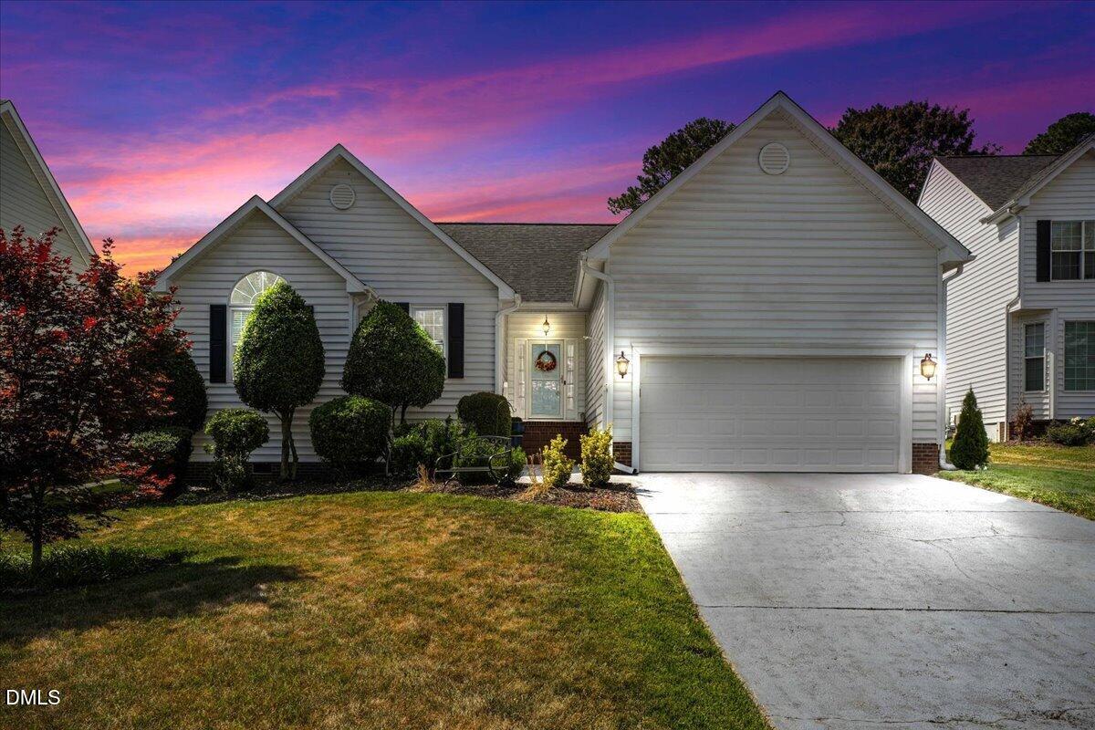 3331 Swinford Court Raleigh, NC 27604 - Photo 2 of 27 a view of a house with a yard