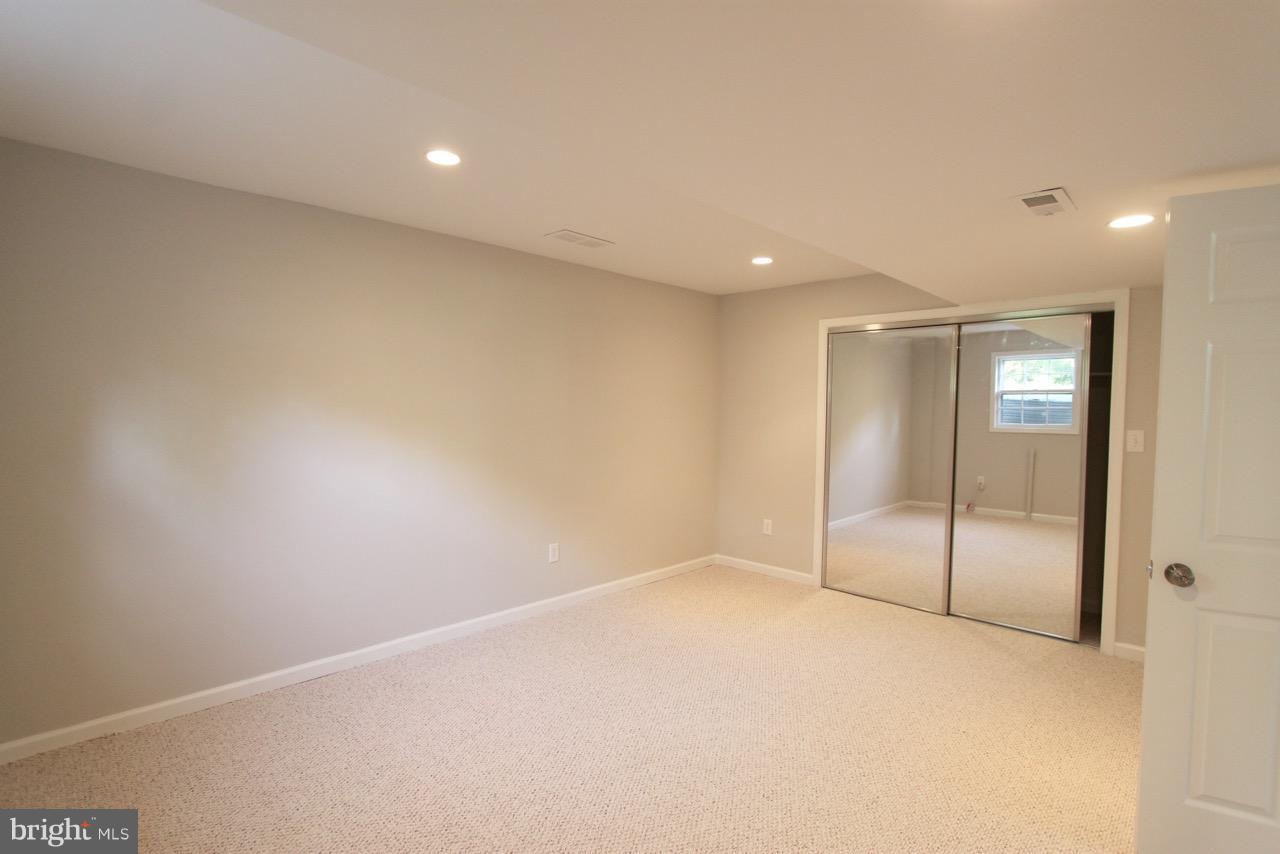 1009 Collingwood Road Alexandria, VA 22308 - Photo 18 of 30 Bedroom #4 - with large closet w/ mirrored doors