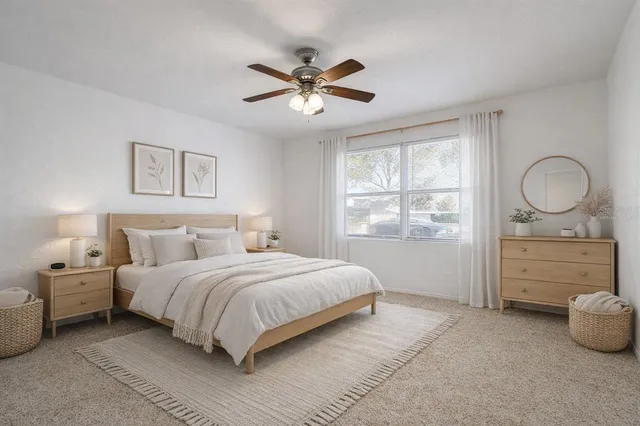 a bedroom with a bed and a dresser