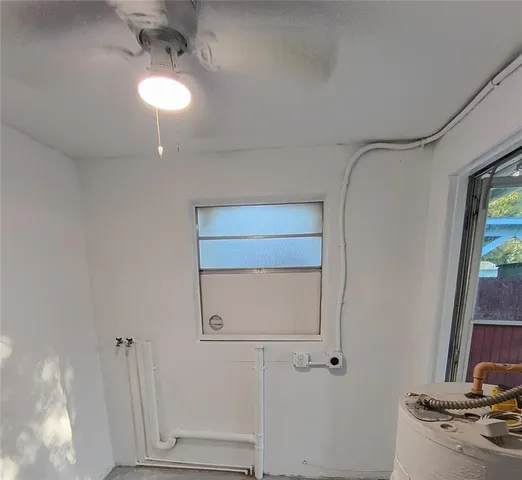 a bathroom with a sink vanity and a mirror