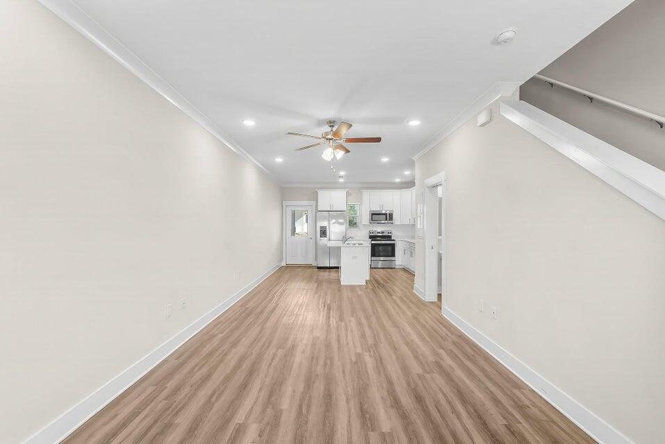 284 North Sand Palm Road, Unit VISTA Freeport, FL 32439 - Photo 6 of 27 a view of a house with wooden floor