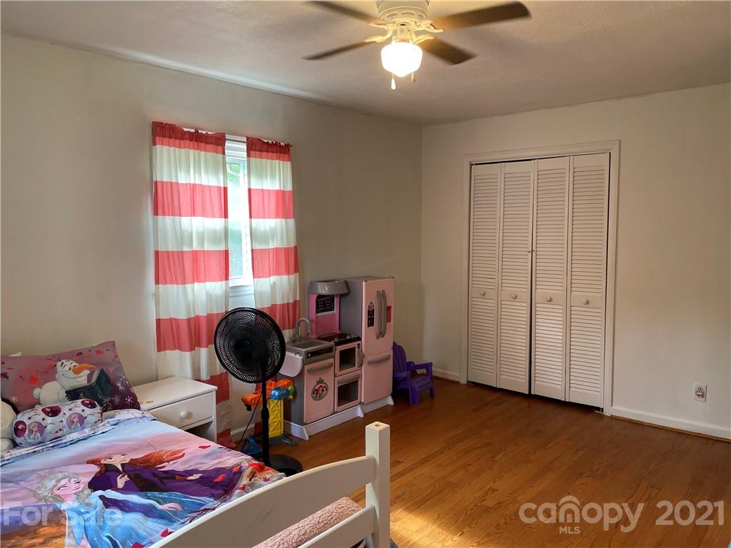 622 Loray Farm Road Dallas, NC 28034 - Photo 11 of 15 a living room with furniture and wooden floor