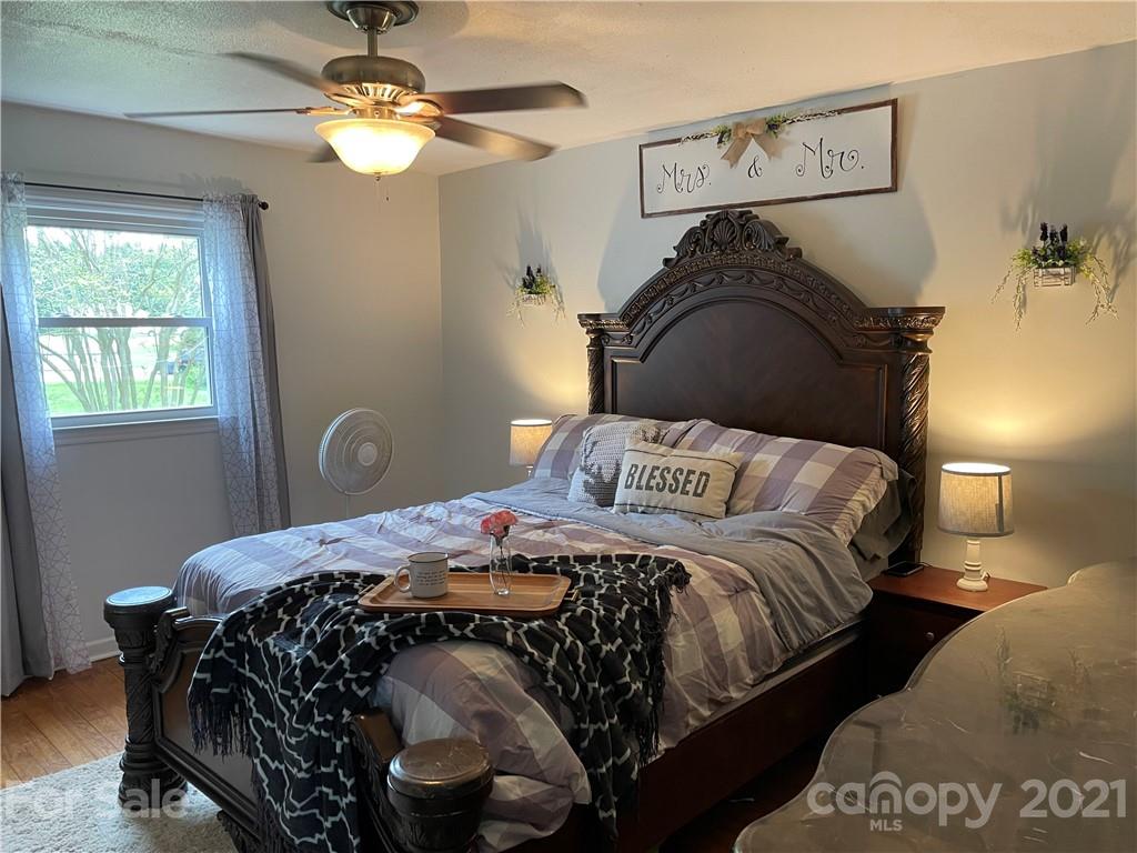 622 Loray Farm Road Dallas, NC 28034 - Photo 15 of 15 a bedroom with a bed and a window
