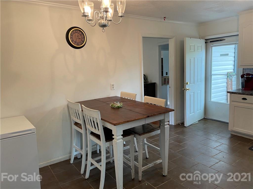 622 Loray Farm Road Dallas, NC 28034 - Photo 3 of 15 a view of a dining room with furniture and a window