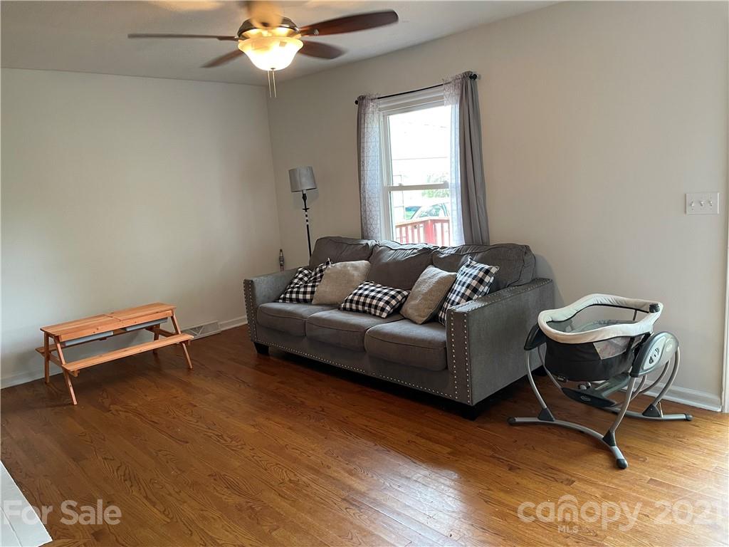 622 Loray Farm Road Dallas, NC 28034 - Photo 7 of 15 a living room with furniture and a window