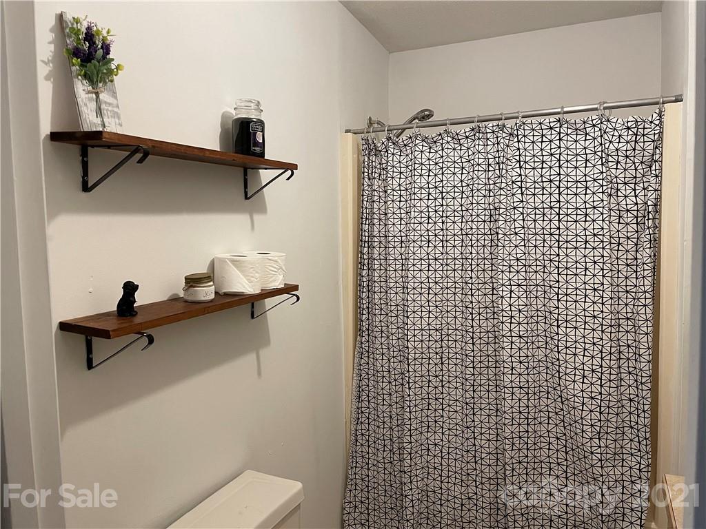 622 Loray Farm Road Dallas, NC 28034 - Photo 9 of 15 a bathroom with a shower