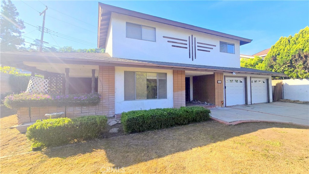 a view of a house with a patio