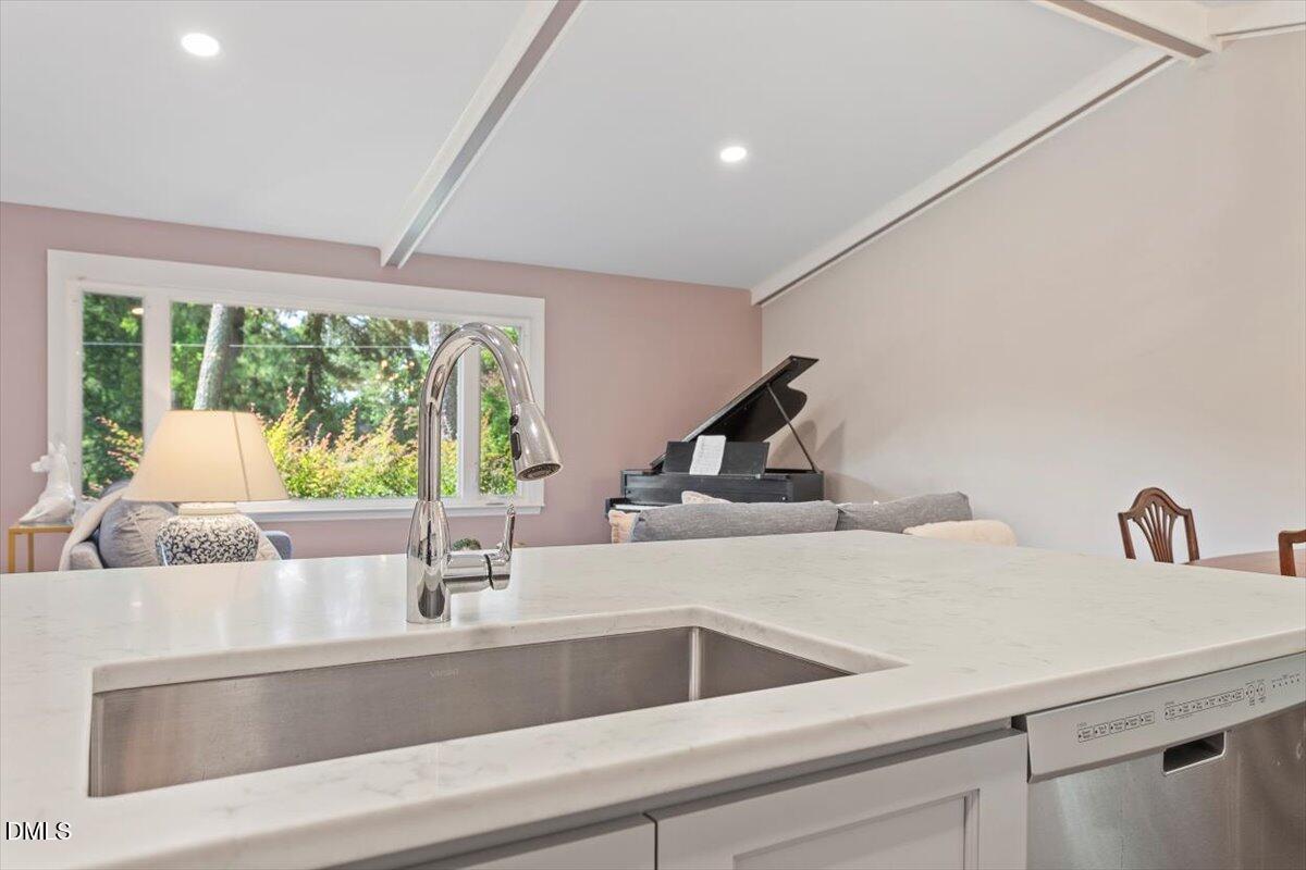 2120 Hillock Drive Raleigh, NC 27612 - Photo 16 of 29 a kitchen with a sink and a large window