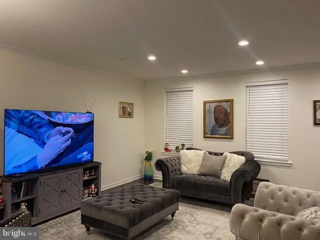 a living room with furniture and a couch