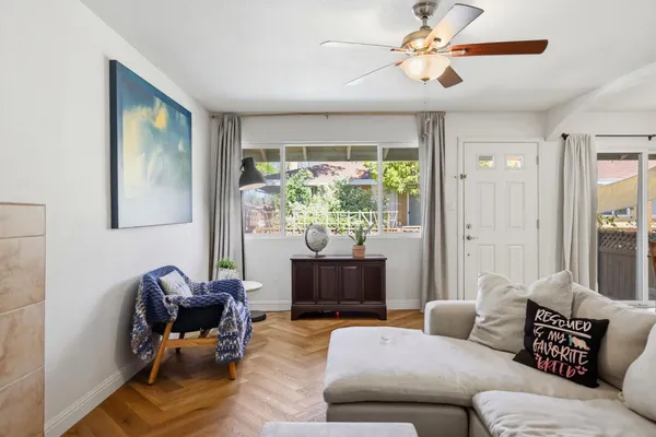 a kitchen with a stove a sink and a refrigerator