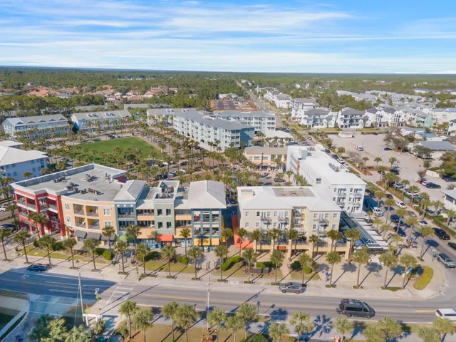an aerial view of a house with a ocean view