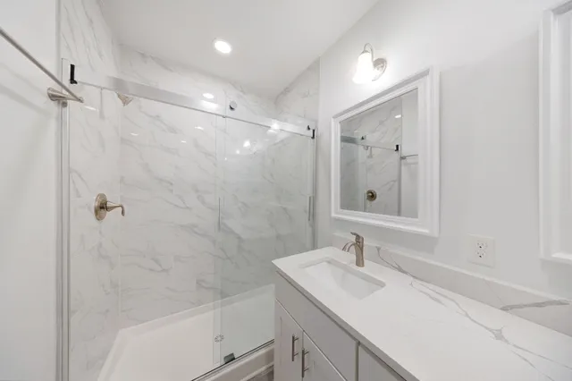 a room with a desk and a window