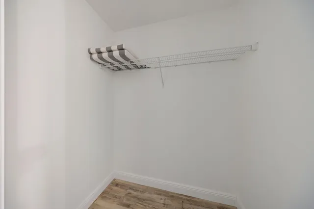 a view of yard with swimming pool and green space