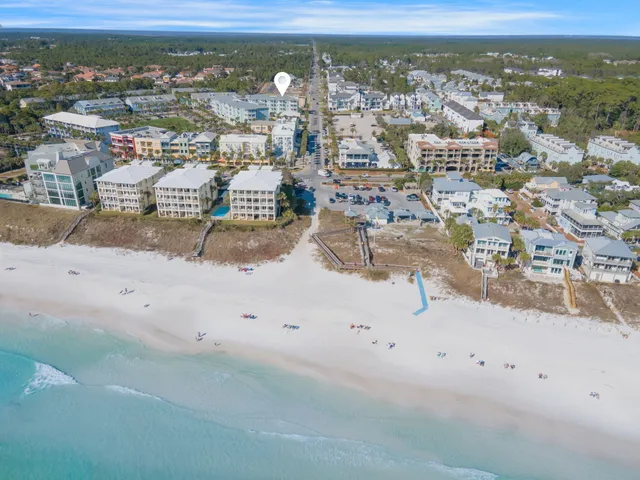 an aerial view of houses with outdoor space