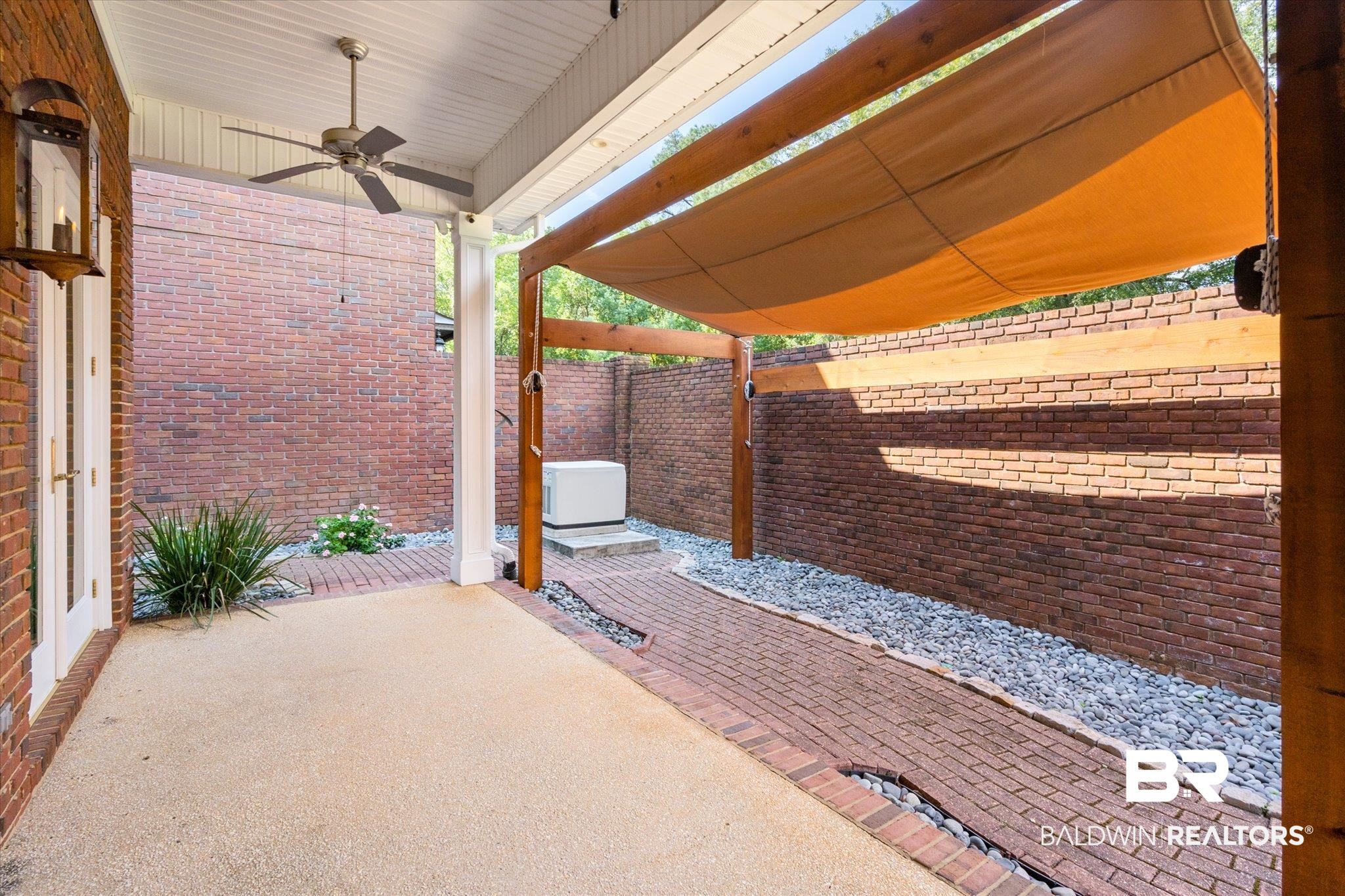 107 Fielding Place Mobile, AL 36608 - Photo 24 of 27 View of patio / terrace with a ceiling fan and a fenced backyard