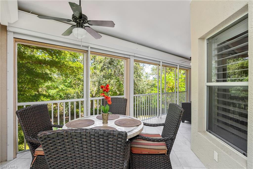 867 Carrick Bend Circle, Unit 2103 Naples, FL 34110 - Photo 25 of 32 a view of a dining room with furniture window and outside view