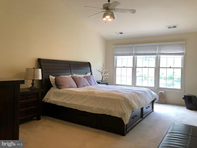 a bathroom with a sink double vanity and shower