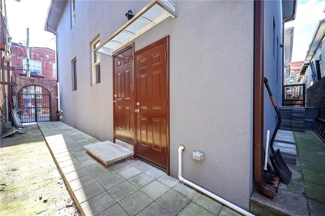 a balcony view with a glass door