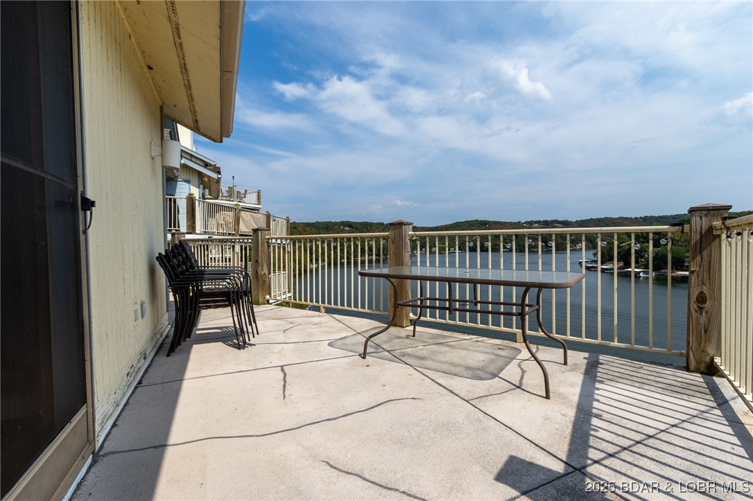 210 Bluff Boulevard, Unit 4B Camdenton, MO 65020 - Photo 1 of 69 Lake View from the walk out deck.