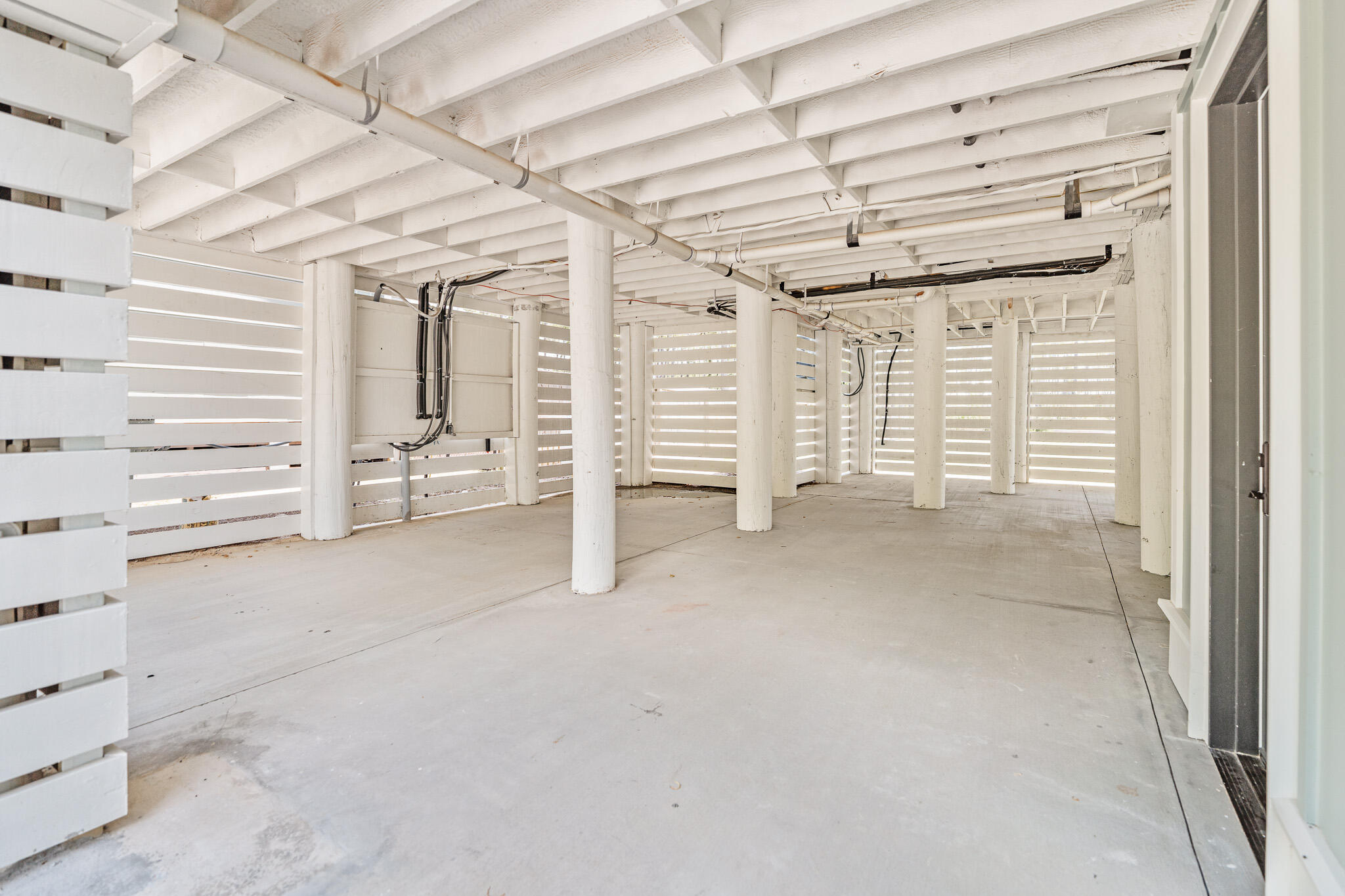 109 West Nursery Road Santa Rosa Beach, FL 32459 - Photo 59 of 60 Carport with Side Ground Entry