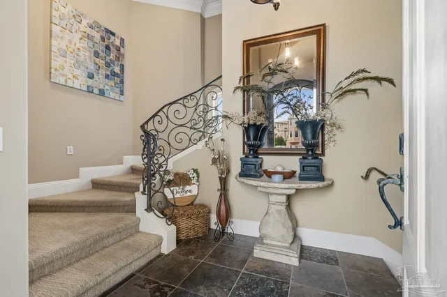a kitchen with stainless steel appliances granite countertop a refrigerator and a stove