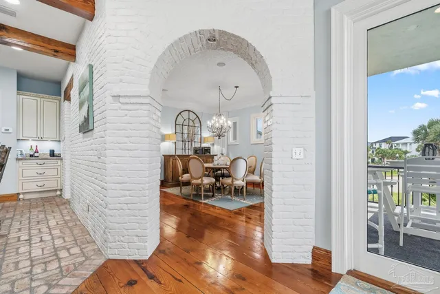 a patio with a table and chairs