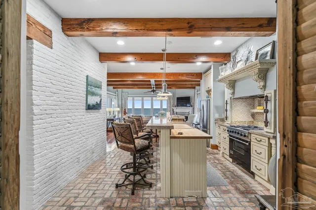 a bathroom with a window and a shower