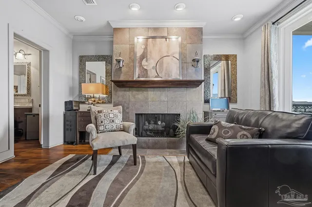 a balcony with furniture and a ceiling fan