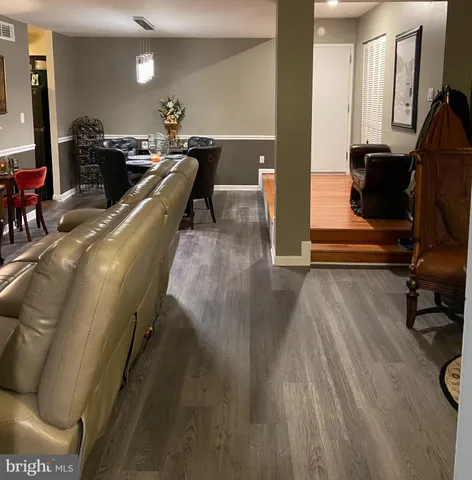 a view of a living room and dining room