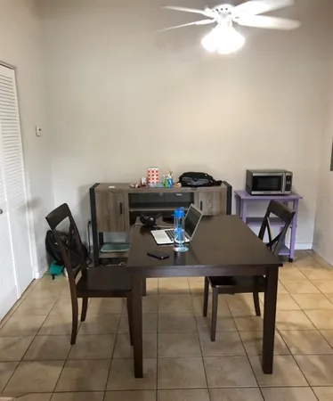 a view of a workspace with furniture