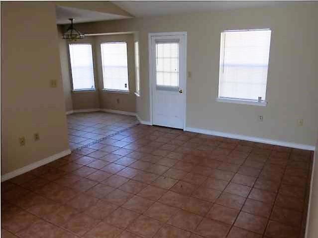 41 3rd Avenue Shalimar, FL 32579 - Photo 3 of 9 an empty room with windows