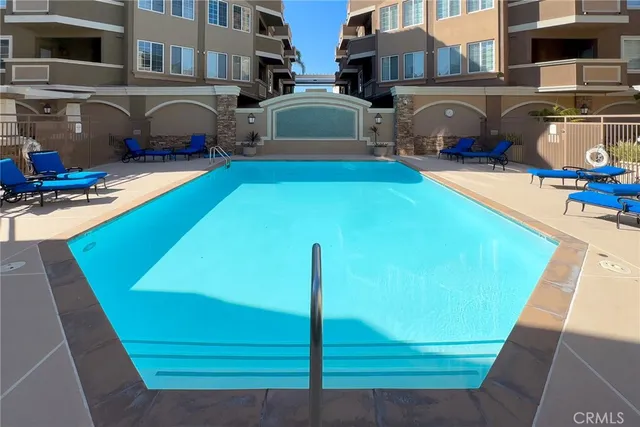 a view of a building with sitting area