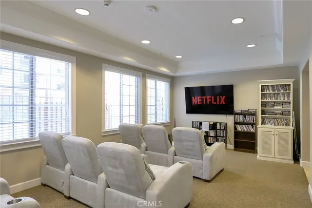 a living room with furniture and windows