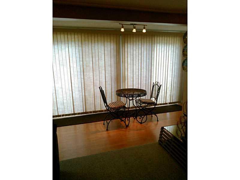 2090 Post Road, Unit 7B Wells, ME 04090 - Photo 13 of 18 Dining Room. Window treatments cover...