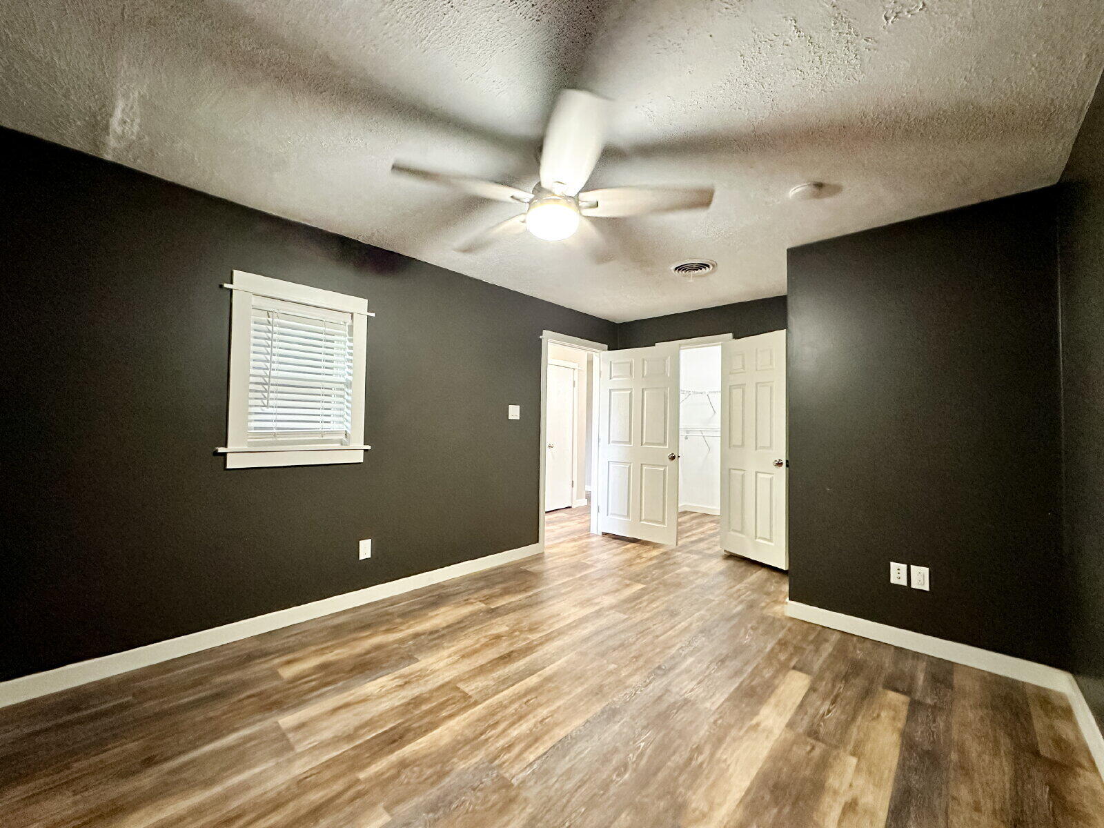 2608 Raleigh Avenue Lubbock, TX 79410 - Photo 3 of 23 a view of a livingroom with a ceiling fan and window