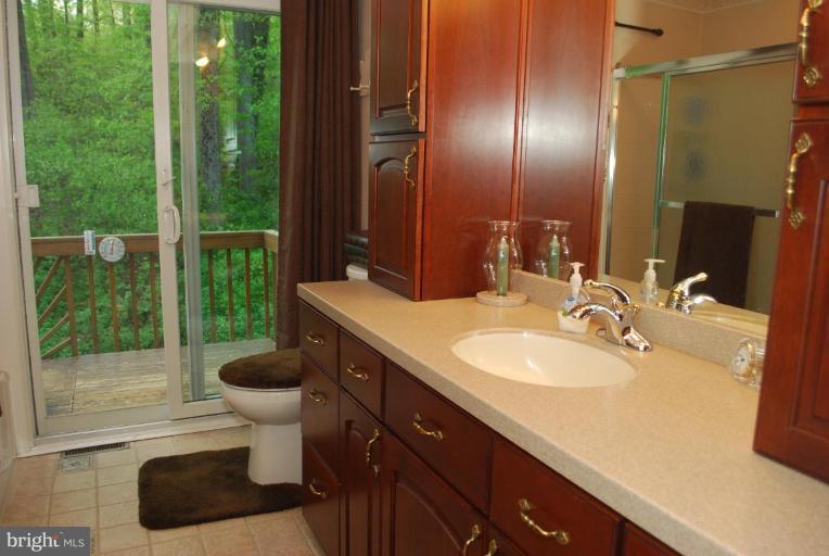 2805 Sandy Hook Road Forest Hill, MD 21050 - Photo 13 of 28 Master Bath Doors to Balcony Deck