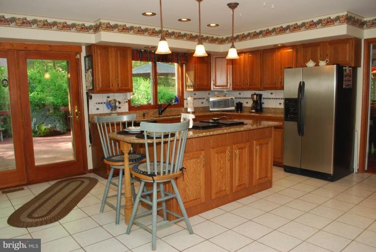 2805 Sandy Hook Road Forest Hill, MD 21050 - Photo 10 of 28 Kitchen Doors Lead to Deck