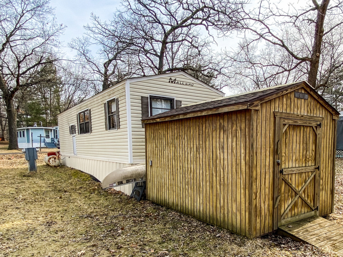 2-110 Woodhaven Lakes Sublette, IL 61367 - Photo 14 of 16 a backyard of a house