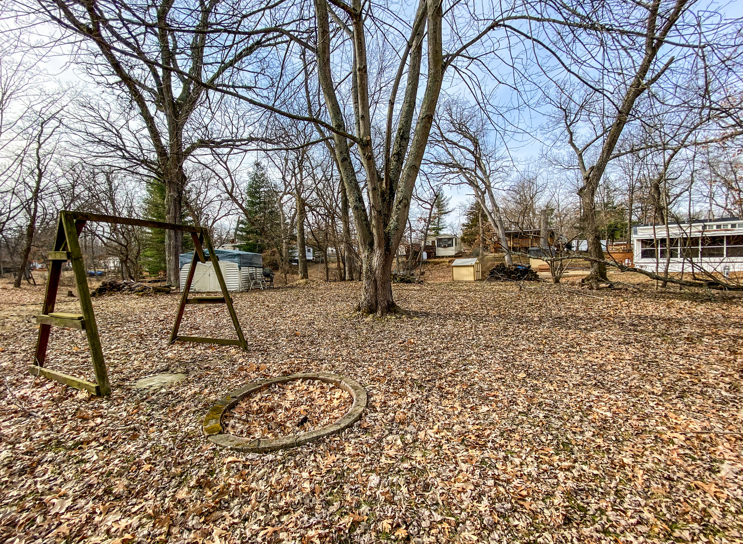 2-110 Woodhaven Lakes Sublette, IL 61367 - Photo 16 of 16 a backyard of a house with lots of green space
