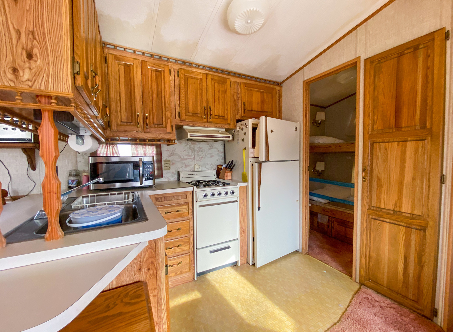 2-110 Woodhaven Lakes Sublette, IL 61367 - Photo 6 of 16 a kitchen with stainless steel appliances a refrigerator and cabinets