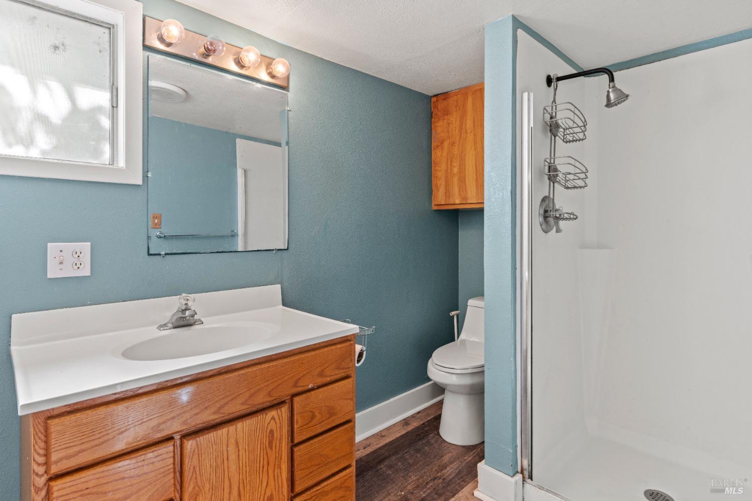 700 Ford Road Ukiah, CA 95482 - Photo 17 of 36 a bathroom with a sink a toilet and shower