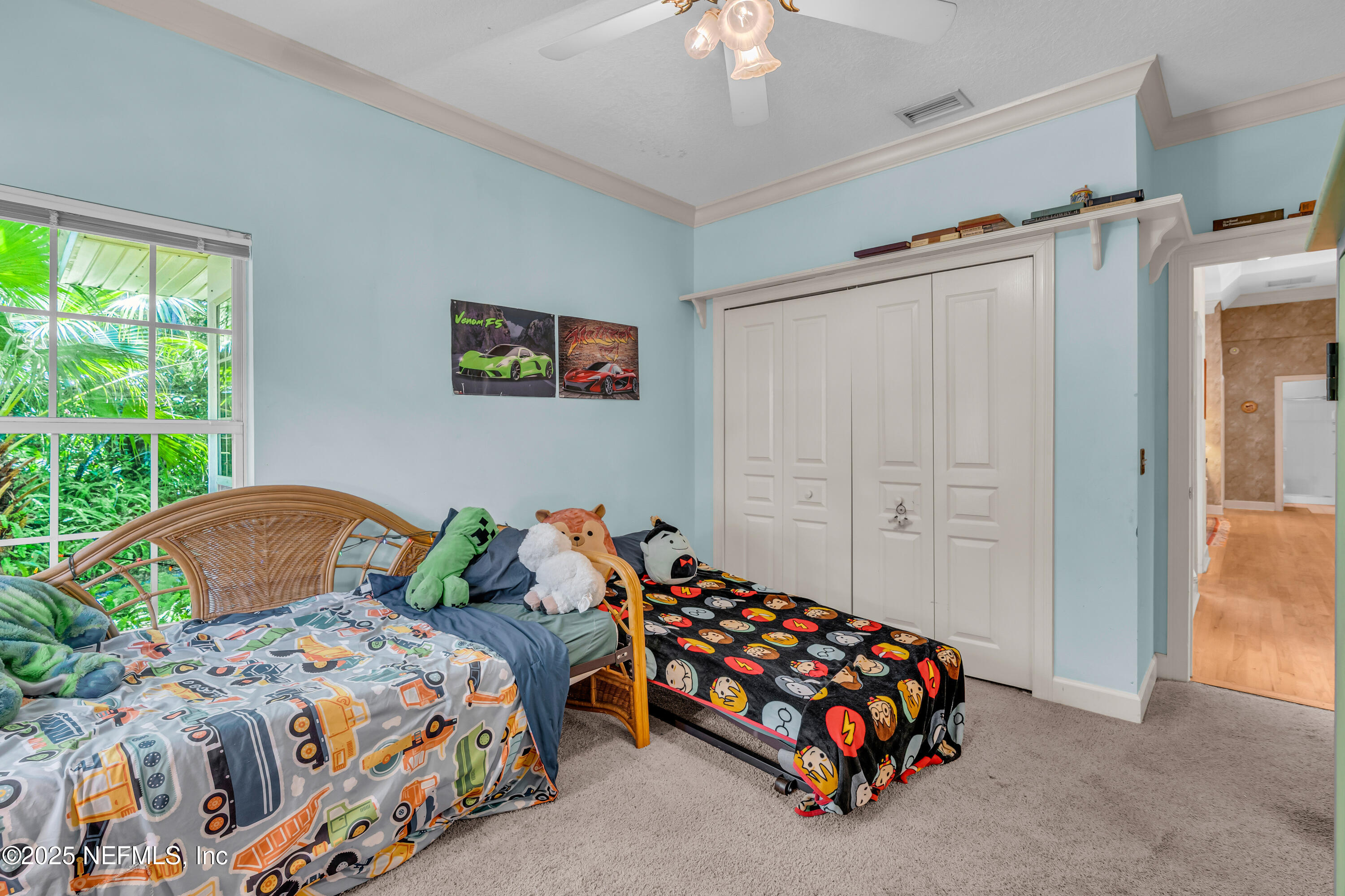 244 Bluebird Lane St. Augustine Beach, FL 32080 - Photo 43 of 66 a bedroom with two beds and a dresser