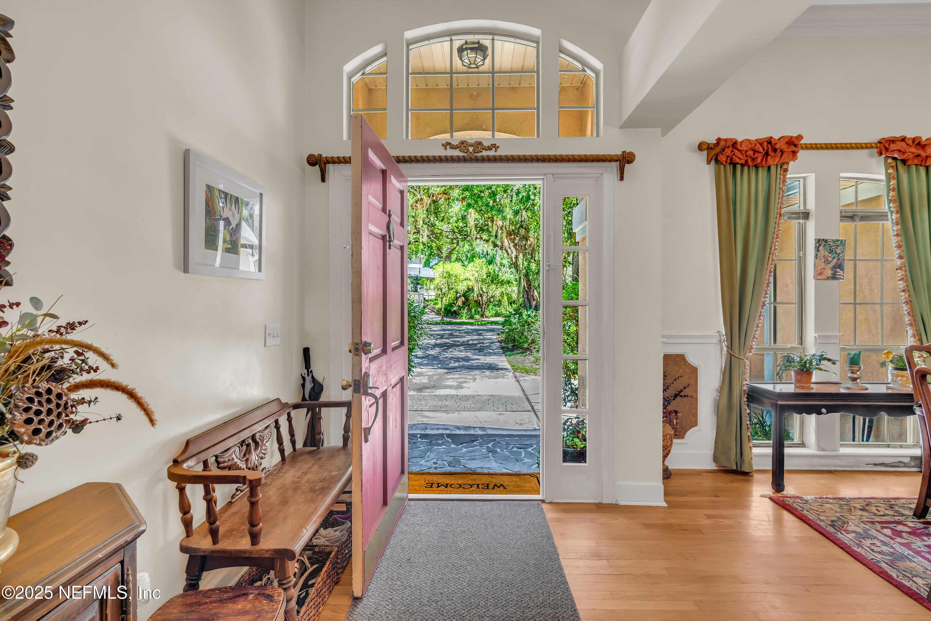 244 Bluebird Lane St. Augustine Beach, FL 32080 - Photo 8 of 66 a front view of a house with garden