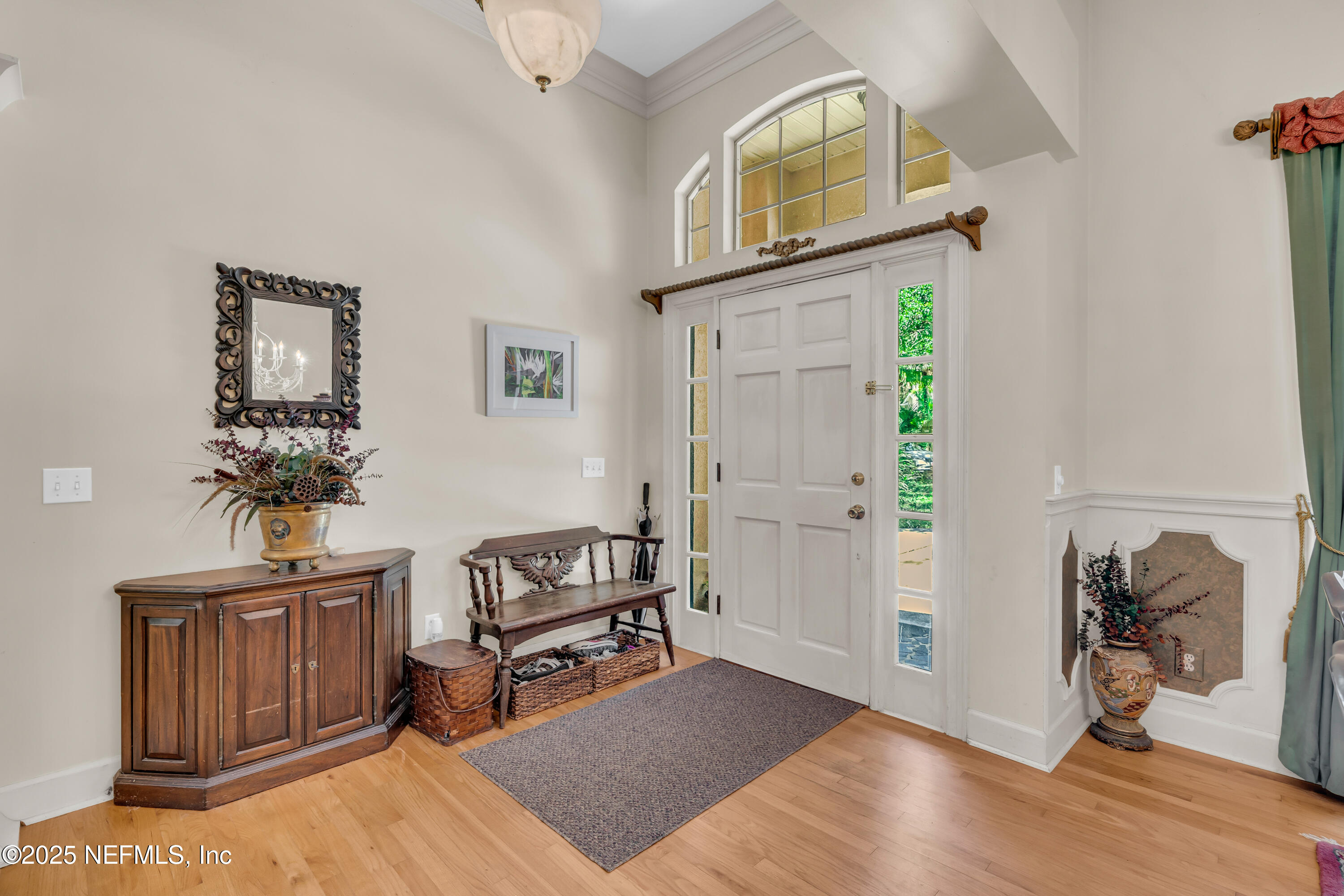 244 Bluebird Lane St. Augustine Beach, FL 32080 - Photo 9 of 66 a living room with furniture and a window