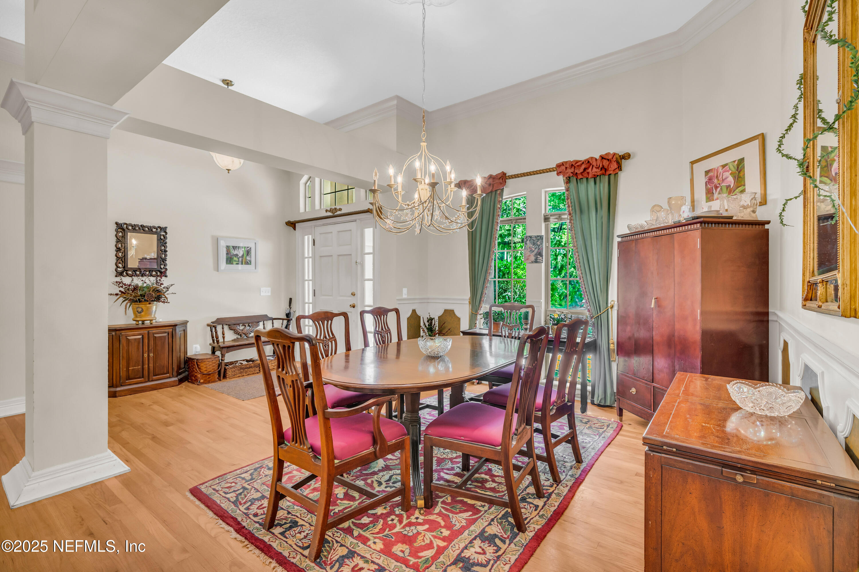 244 Bluebird Lane St. Augustine Beach, FL 32080 - Photo 10 of 66 a view of a dining room with furniture window and wooden floor
