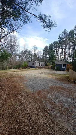 a view of a yard with an outdoor space