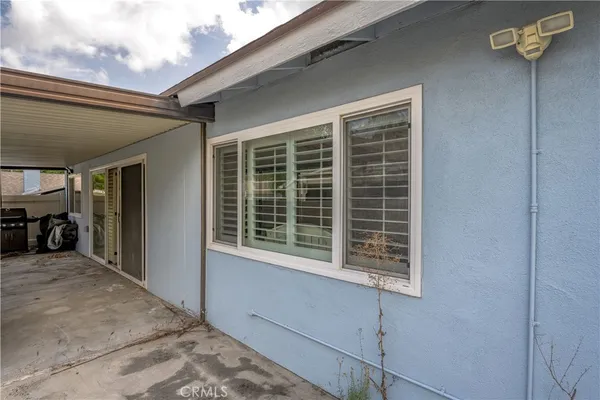 a view of a hallway with a window
