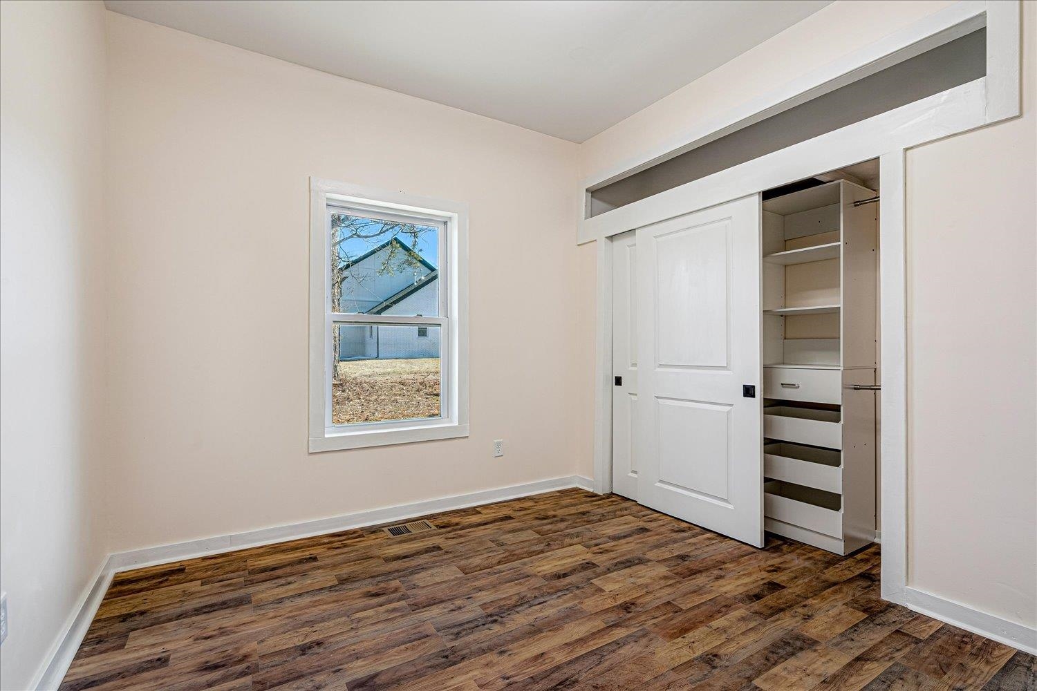 245 Ecology Loop Eads, TN 38028 - Photo 21 of 23 a view of a room that has a bed and a window