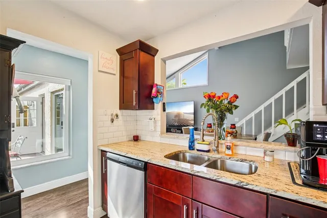 a bathroom with sink and a mirror